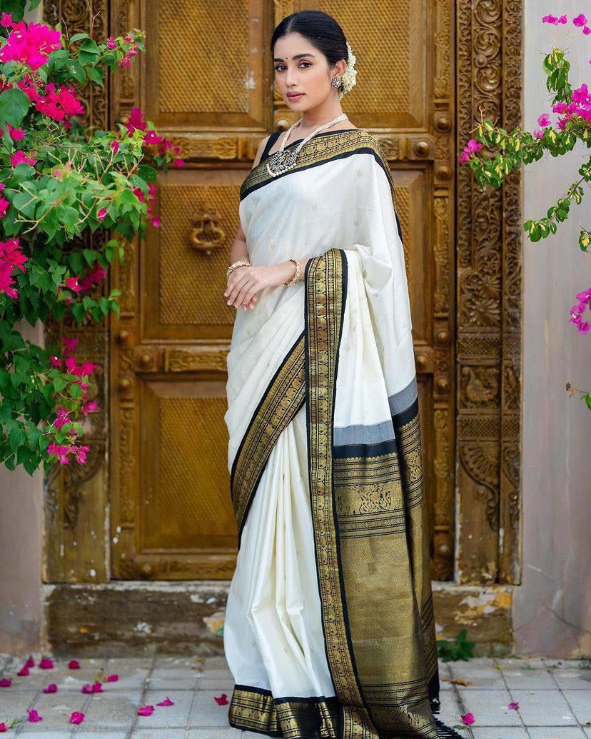 Elegant White Silk Saree with Black and Gold Border