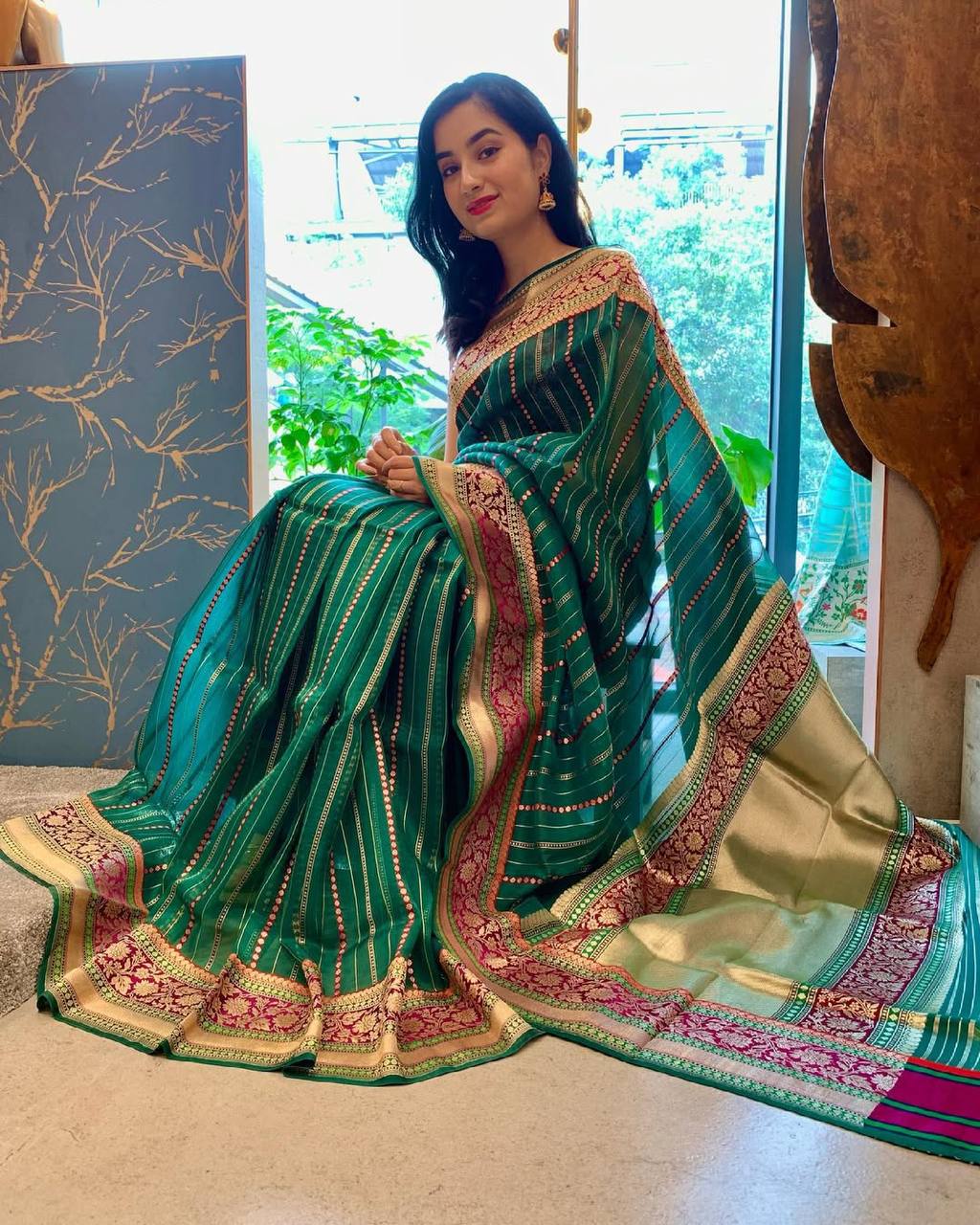 Green Silk Saree with Zari Border and Pink Embroidered Pallu