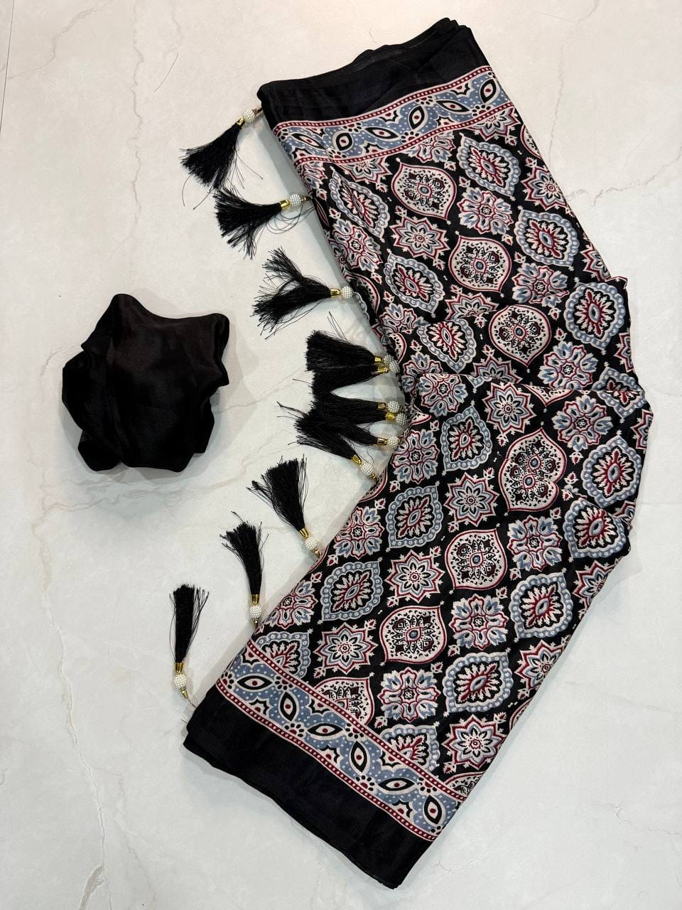 Premium Ajrakh Designer Crepe Silk Saree with Multi-Pattern Border & Tassel Work