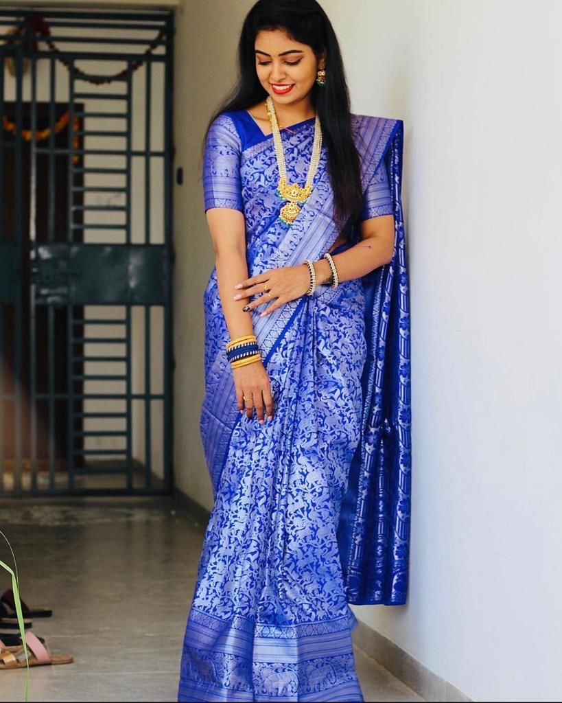 Blue Silk Saree with Intricate Floral Jacquard Work and Traditional Border