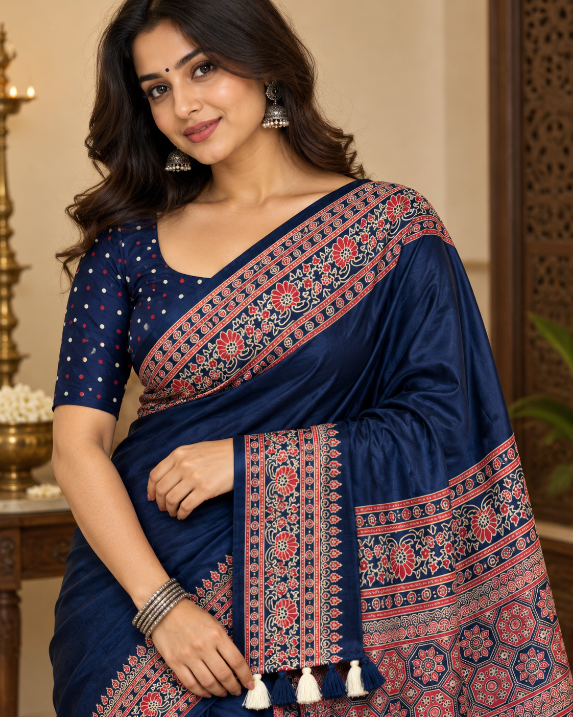 Premium Ajrakh Designer Crepe Silk Saree with Floral Border & Tassel Detailing