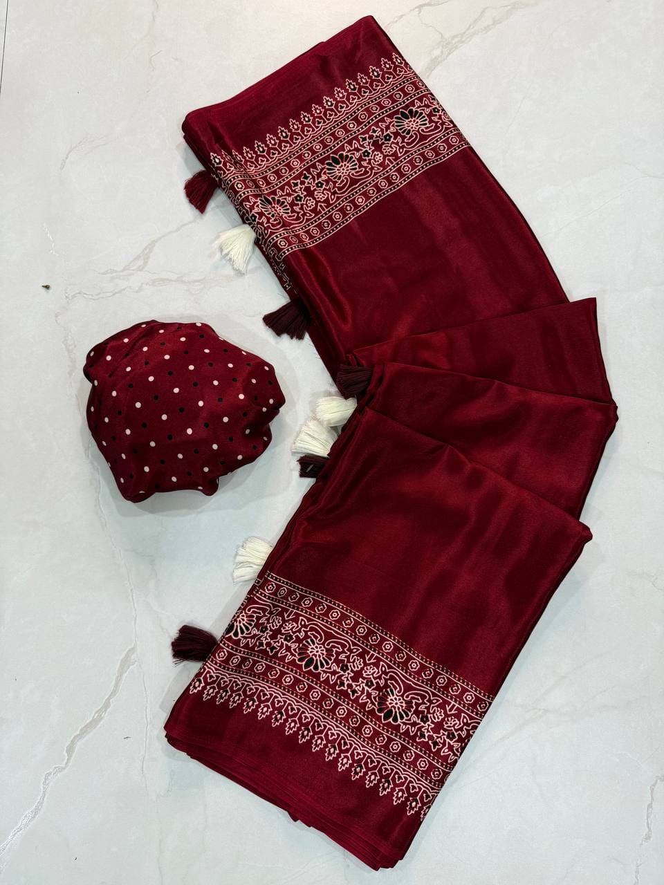 Premium Ajrakh Designer Crepe Silk Saree with Floral Border & Tassel Detailing