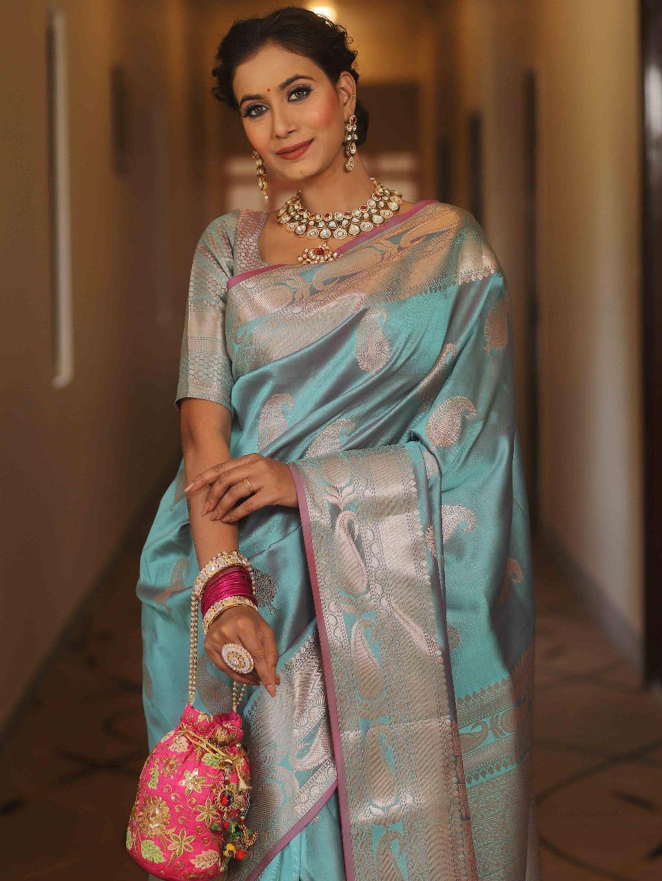 Elegant Turquoise Blue Kanjivaram Silk Saree with Silver Zari Border