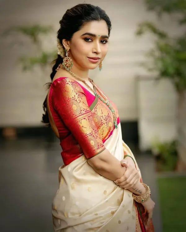 Traditional Off White Silk Saree with Red and Gold Zari Border