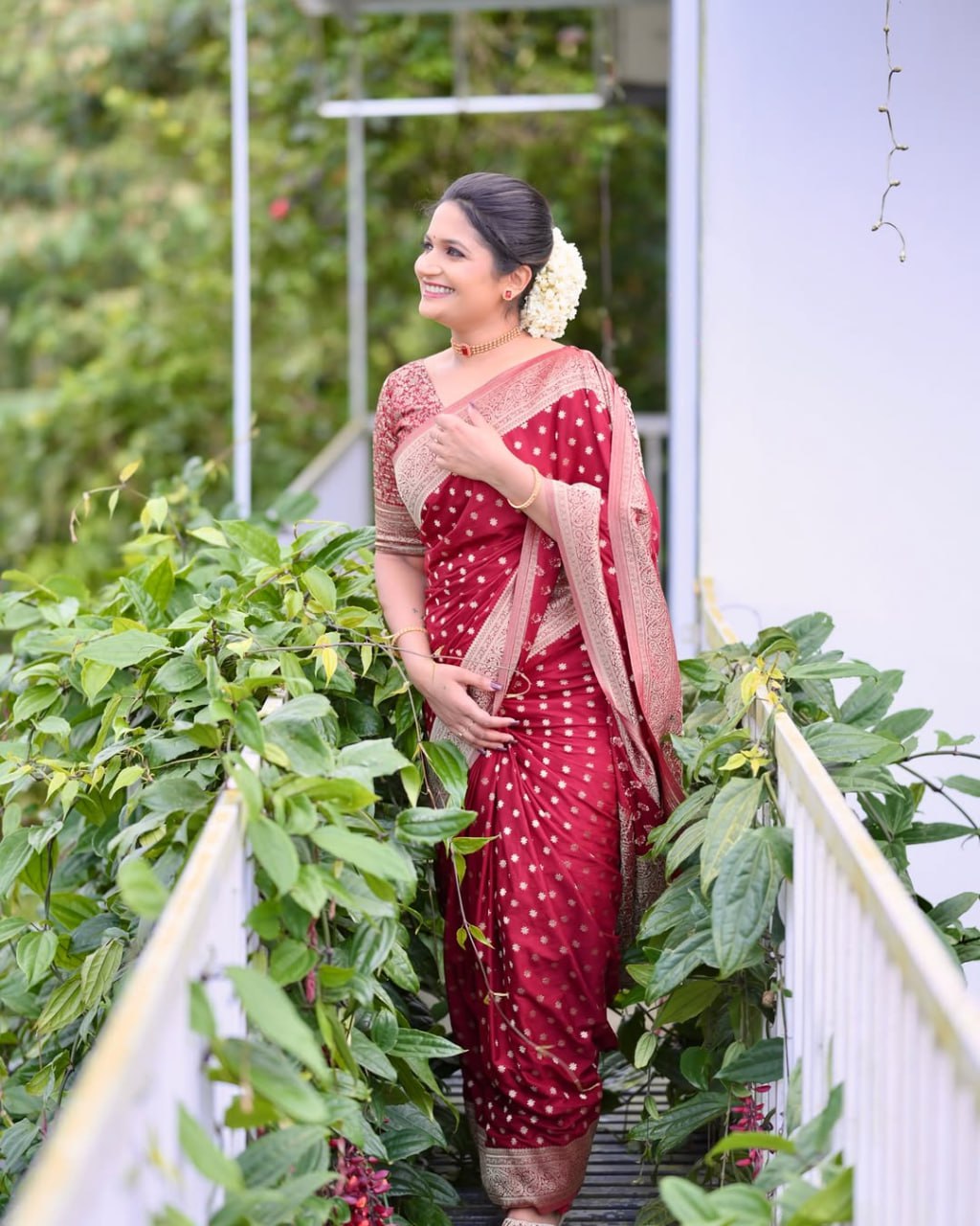 Maroon Banarasi Silk Saree with Golden Buti Work and Embroidered Blouse
