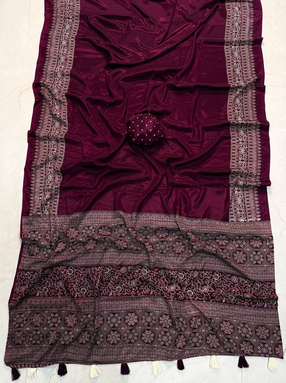Premium Ajrakh Designer Crepe Silk Saree with Floral Border & Tassel Detailing