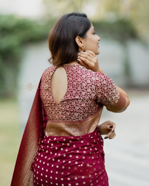 Maroon Banarasi Silk Saree with Golden Buti Work and Embroidered Blouse