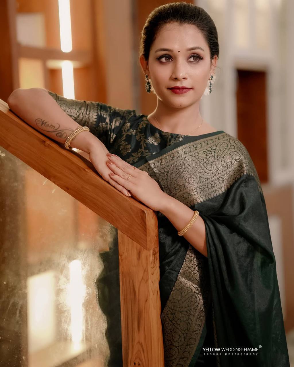Elegant Dark Green Banarasi Silk Saree with Zari Border