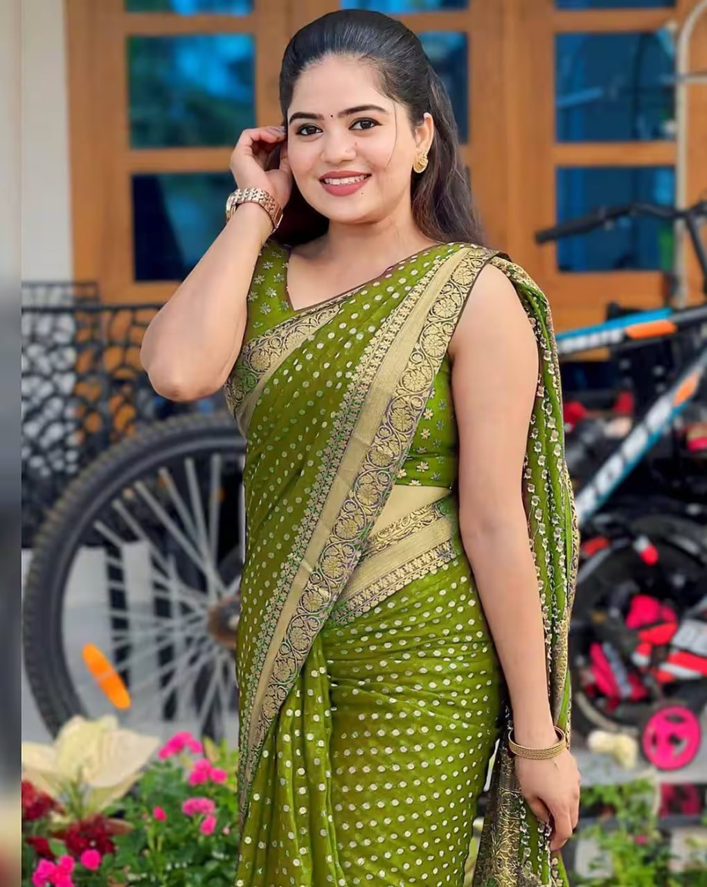 Green Banarasi Silk Saree with Golden Zari Border and Polka Dot Pattern
