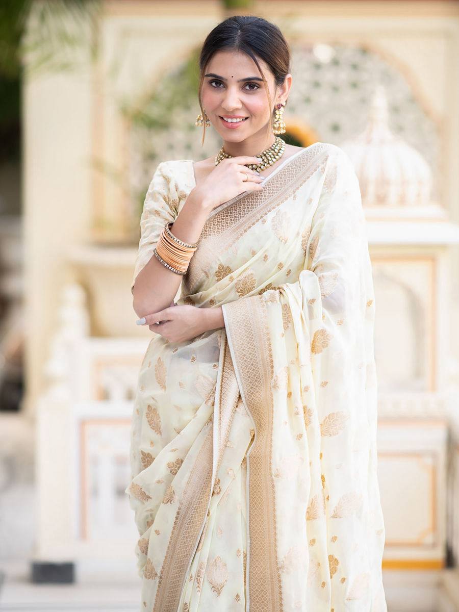 Elegant White Silk Saree with Golden Buti Work and Woven Border