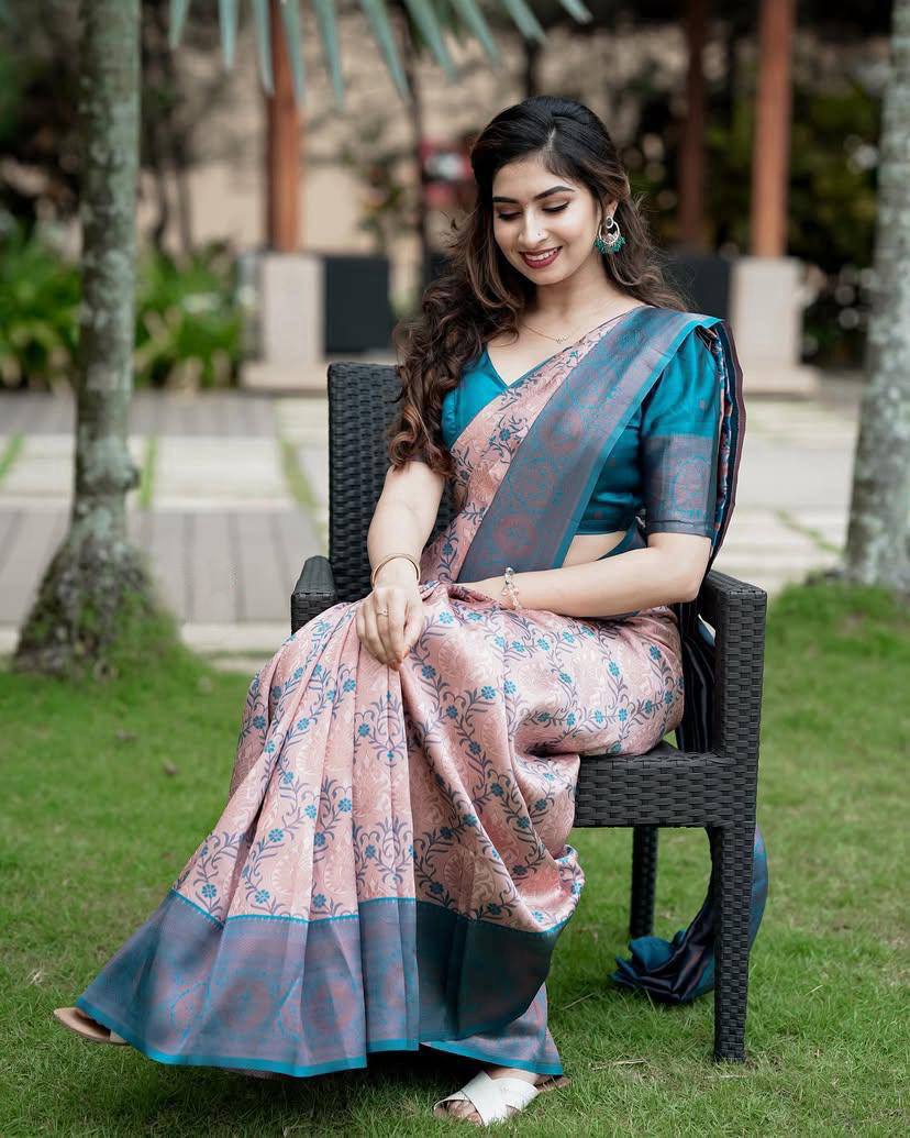 Peach Pink Silk Saree with Teal Blue Border and Floral Motifs