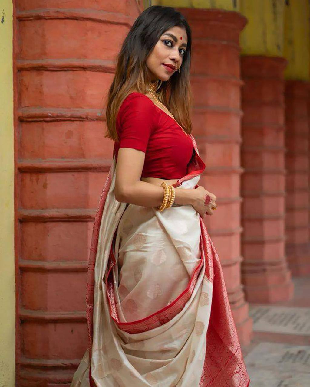 Elegant Off White Silk Saree with Red Zari Border and Floral Motifs