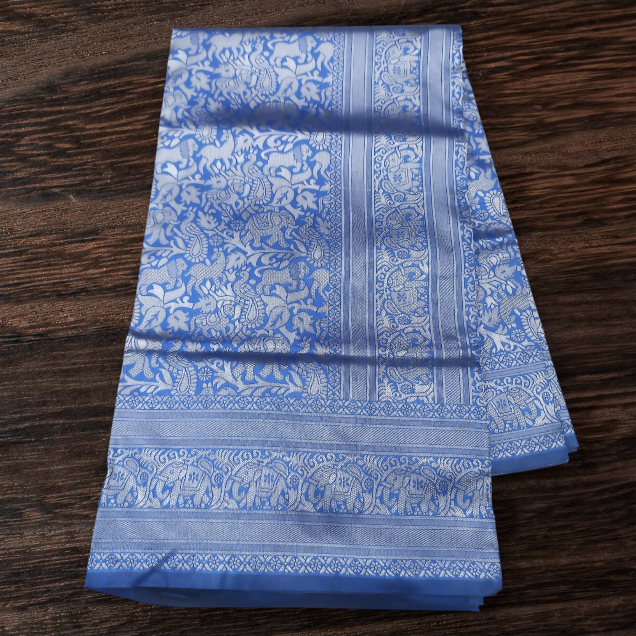 Blue Silk Saree with Intricate Floral Jacquard Work and Traditional Border