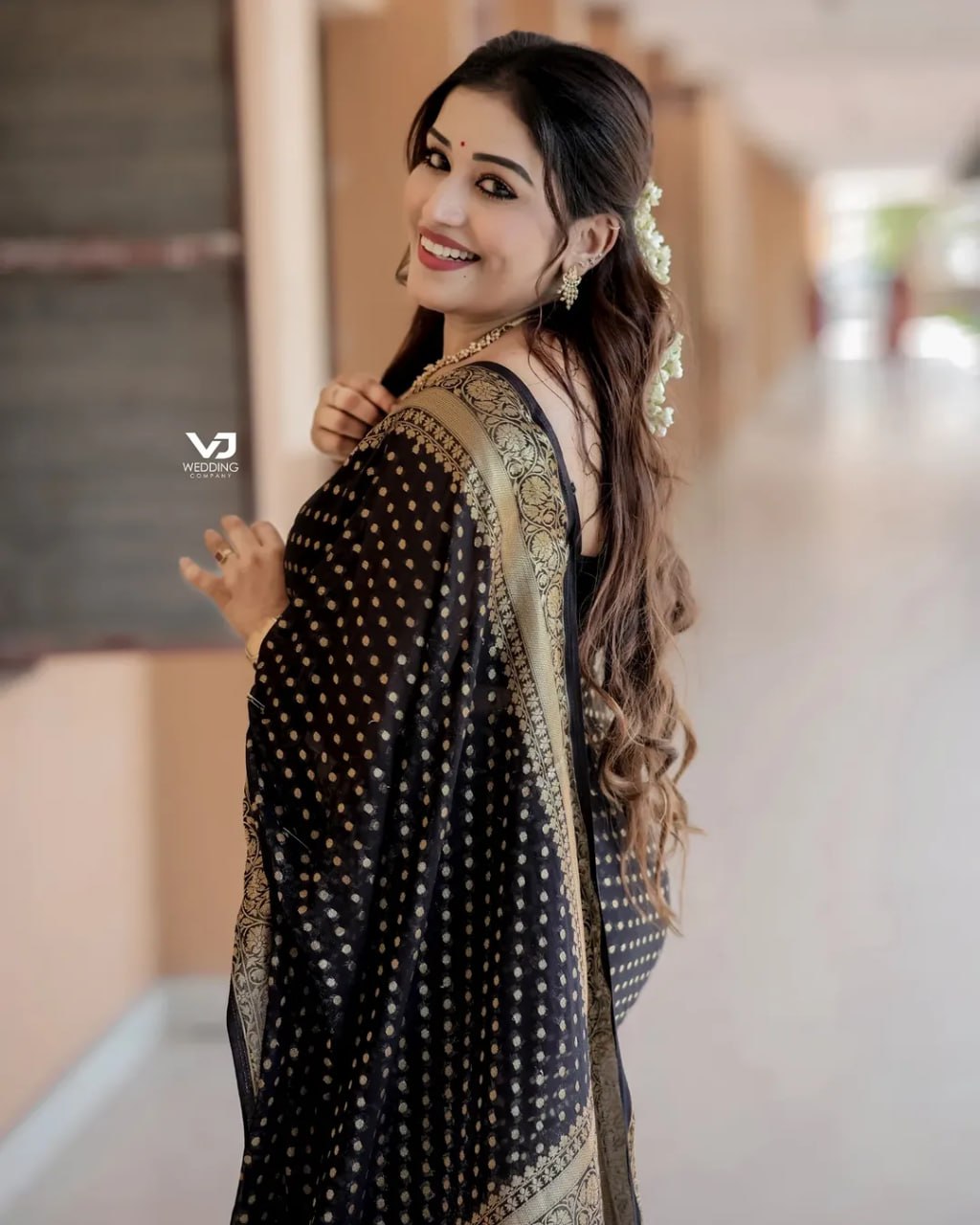 Elegant Black Saree with Golden Border and Sequin Work
