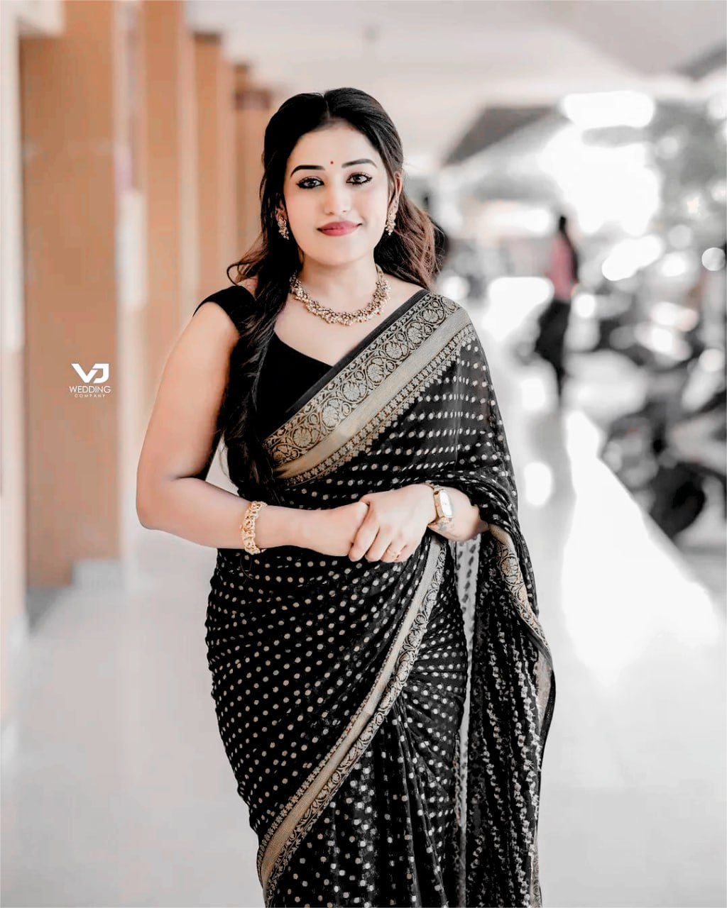 Elegant Black Saree with Golden Border and Sequin Work