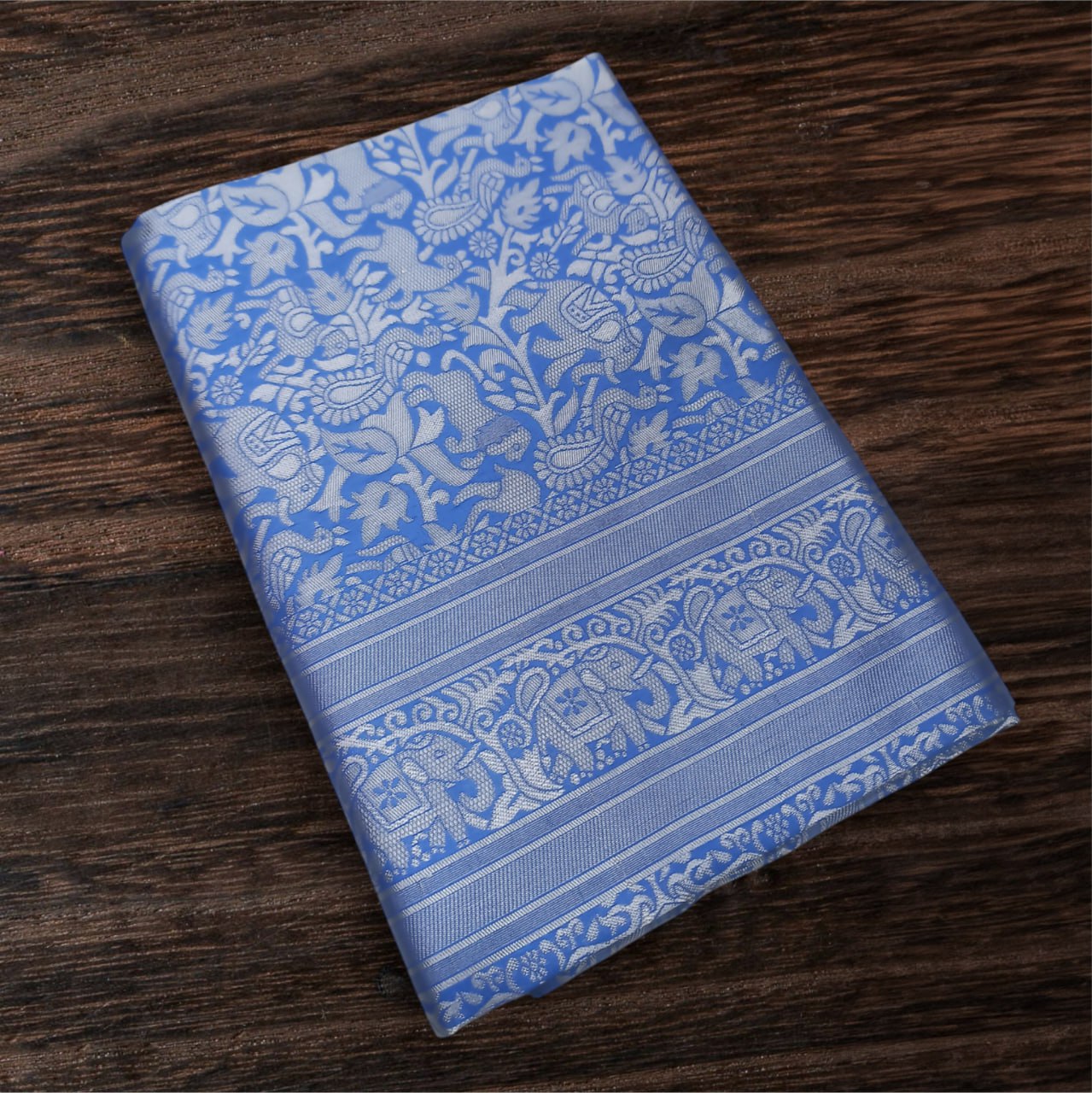 Blue Silk Saree with Intricate Floral Jacquard Work and Traditional Border
