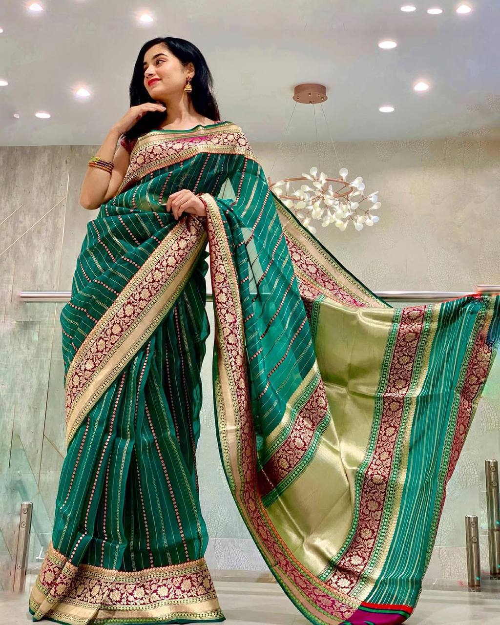 Green Silk Saree with Zari Border and Pink Embroidered Pallu