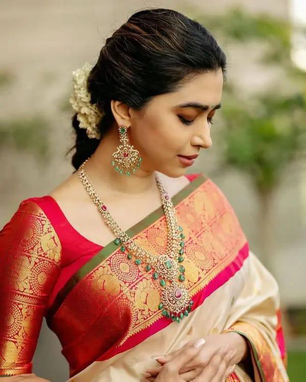 Traditional Off White Silk Saree with Red and Gold Zari Border