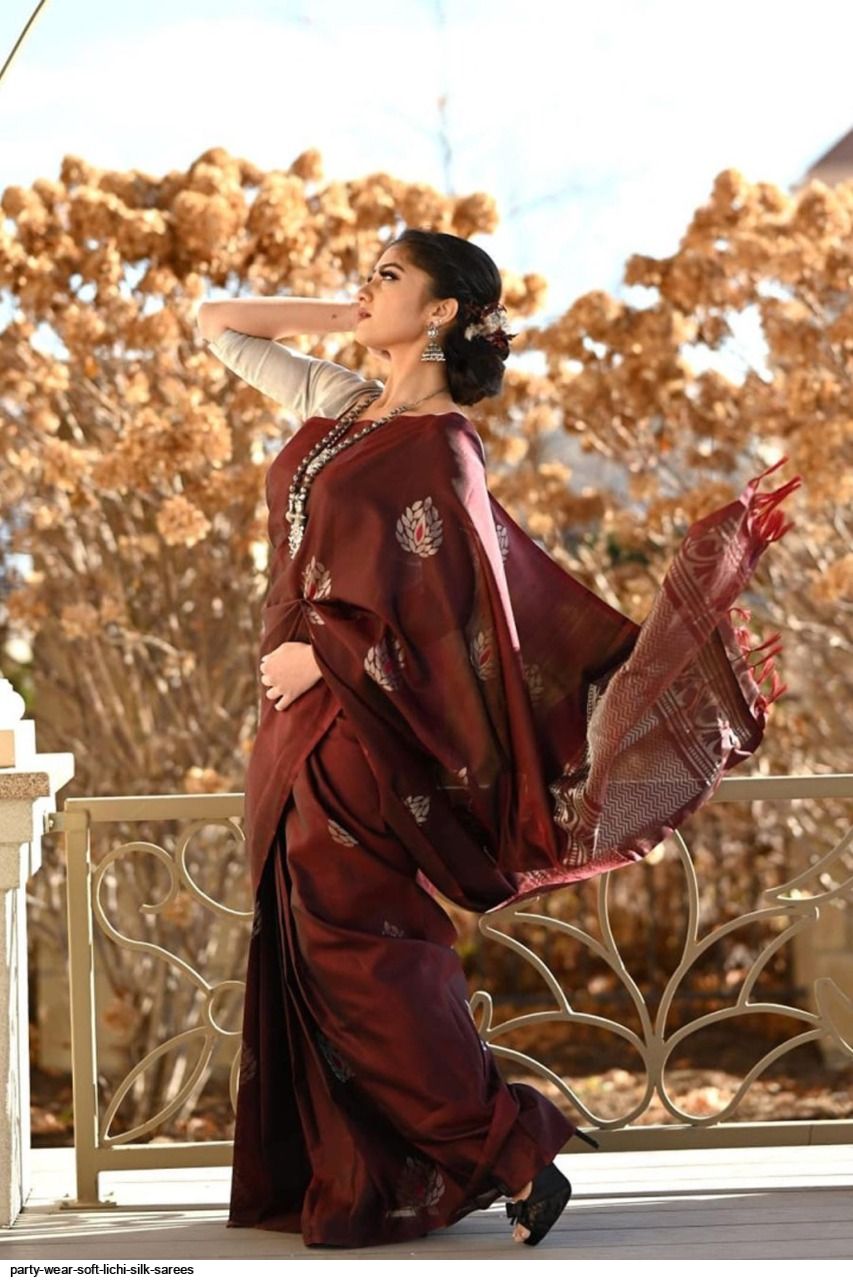 Maroon Silk Saree with Floral Embroidered Motifs and Matching Blouse