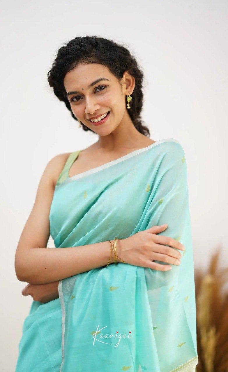 Mint Green Organza Saree with Golden Motifs and Yellow Border