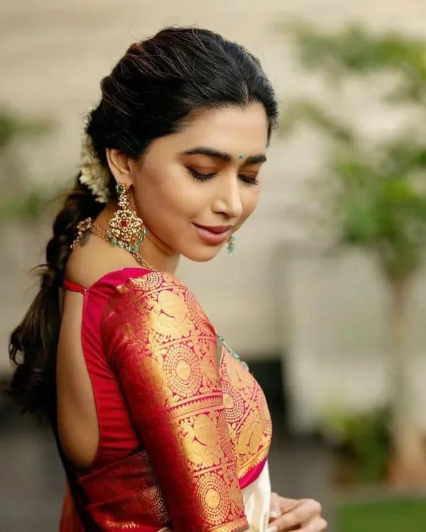 Traditional Off White Silk Saree with Red and Gold Zari Border