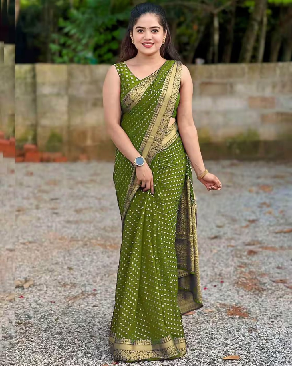 Green Banarasi Silk Saree with Golden Zari Border and Polka Dot Pattern