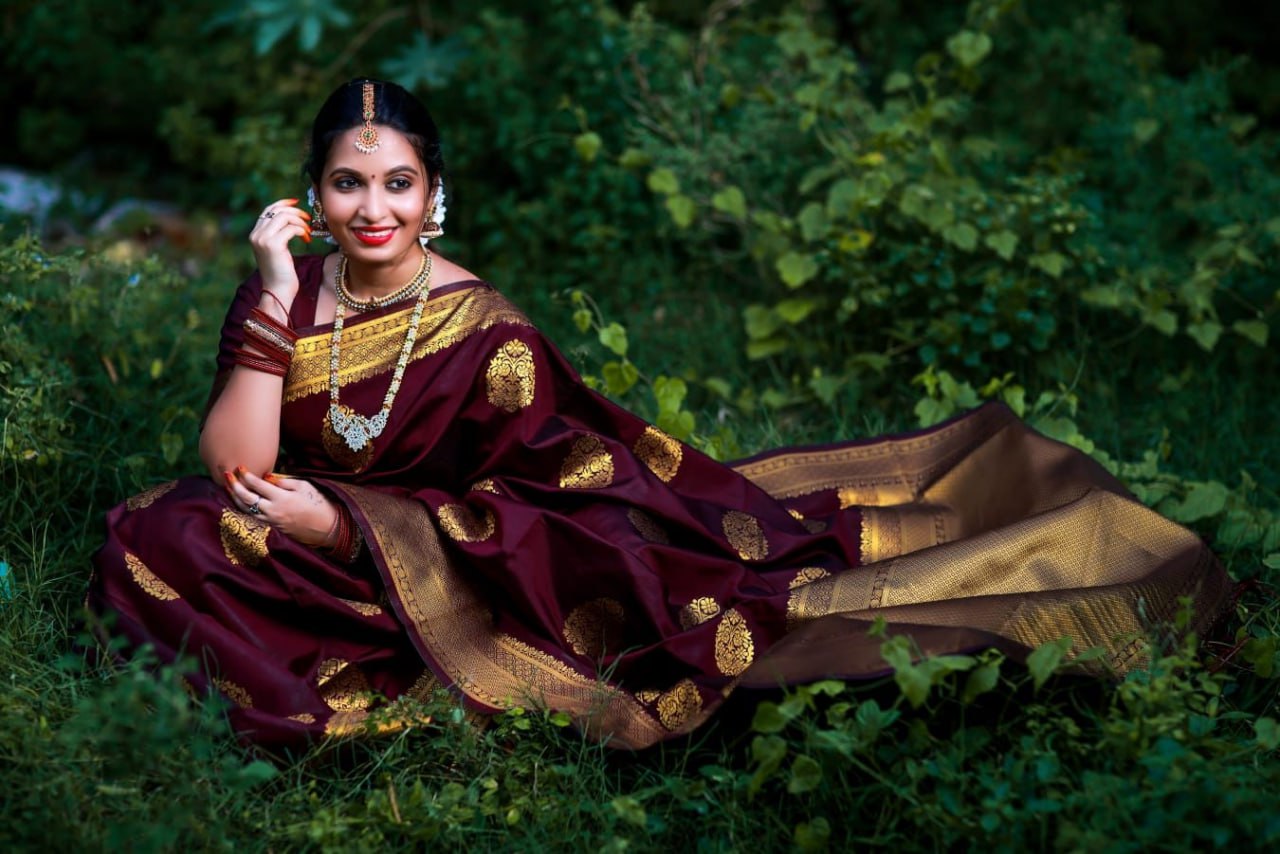 Traditional Maroon Silk Saree with Golden Zari Border and Motifs