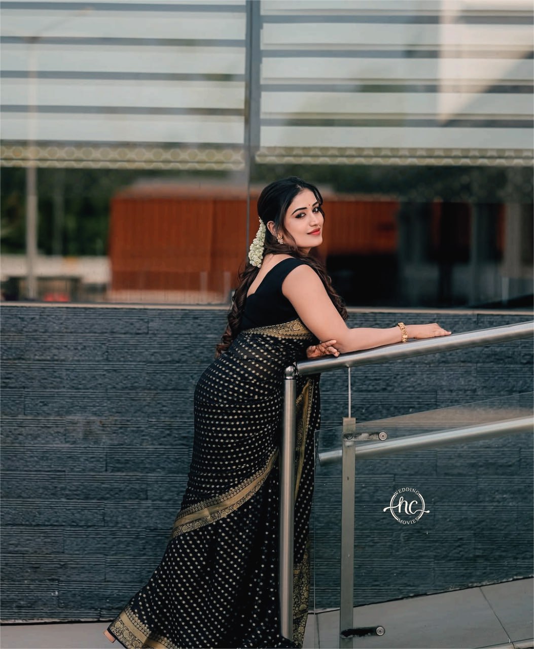 Elegant Black Saree with Golden Border and Sequin Work