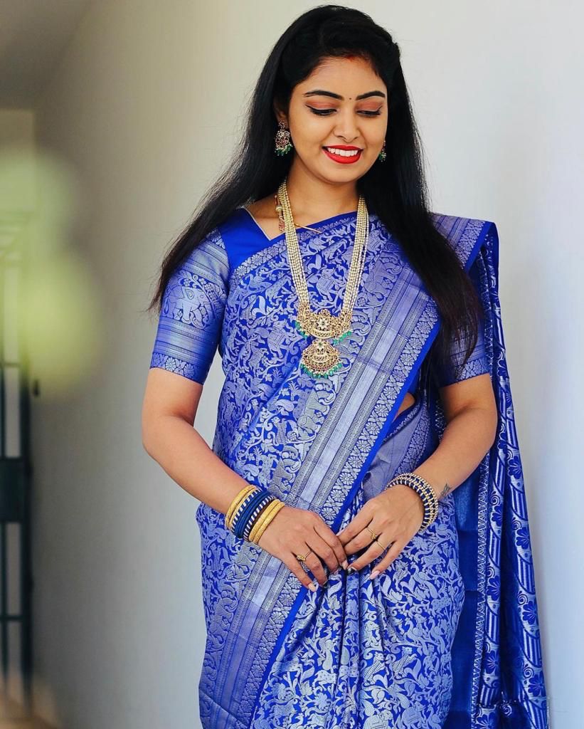 Blue Silk Saree with Intricate Floral Jacquard Work and Traditional Border