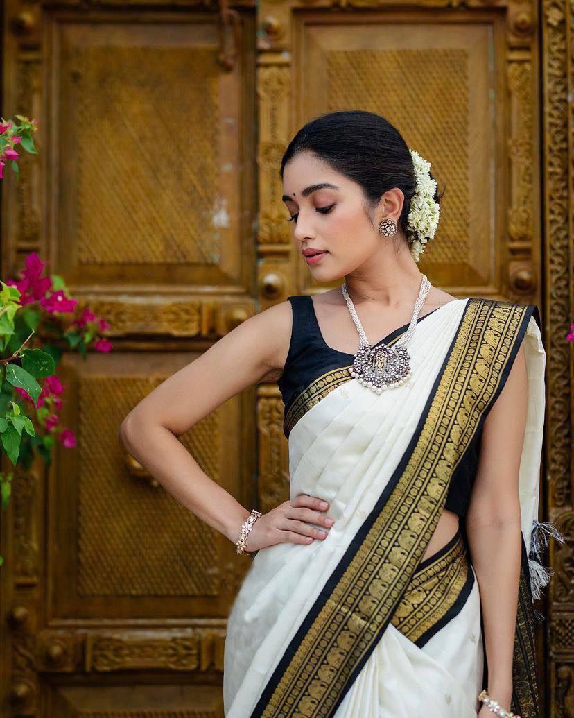 Elegant White Silk Saree with Black and Gold Border