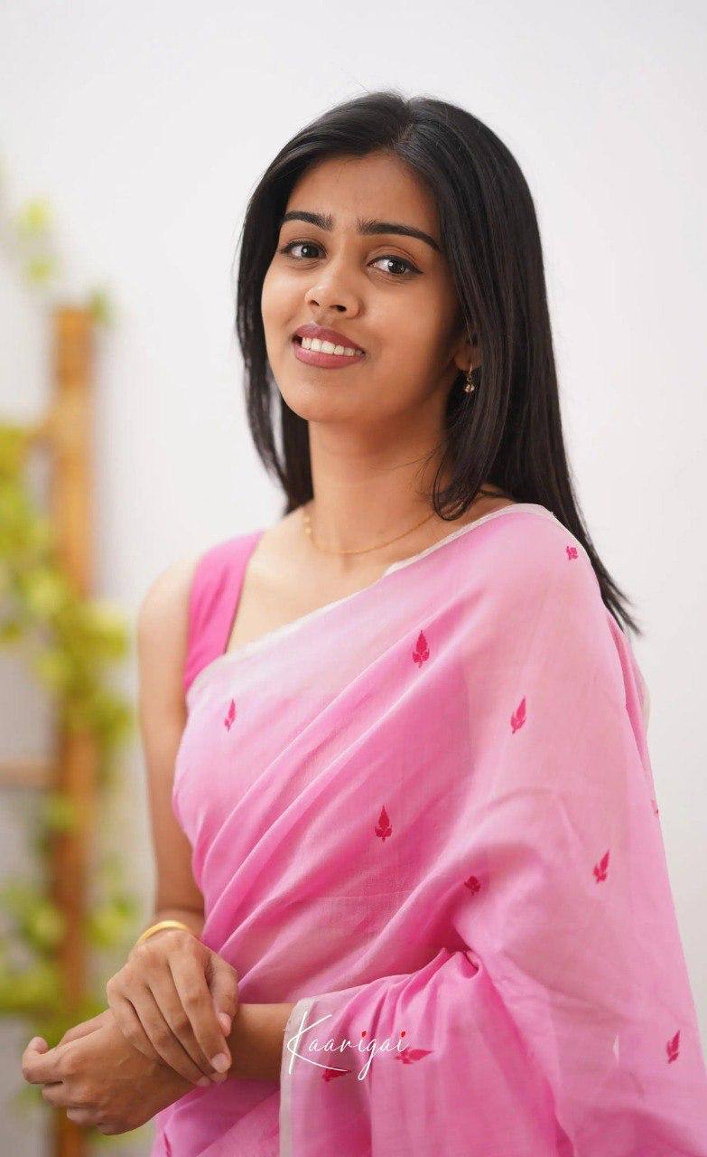 Pink Linen Saree with Embroidered Motifs and Contrast Border