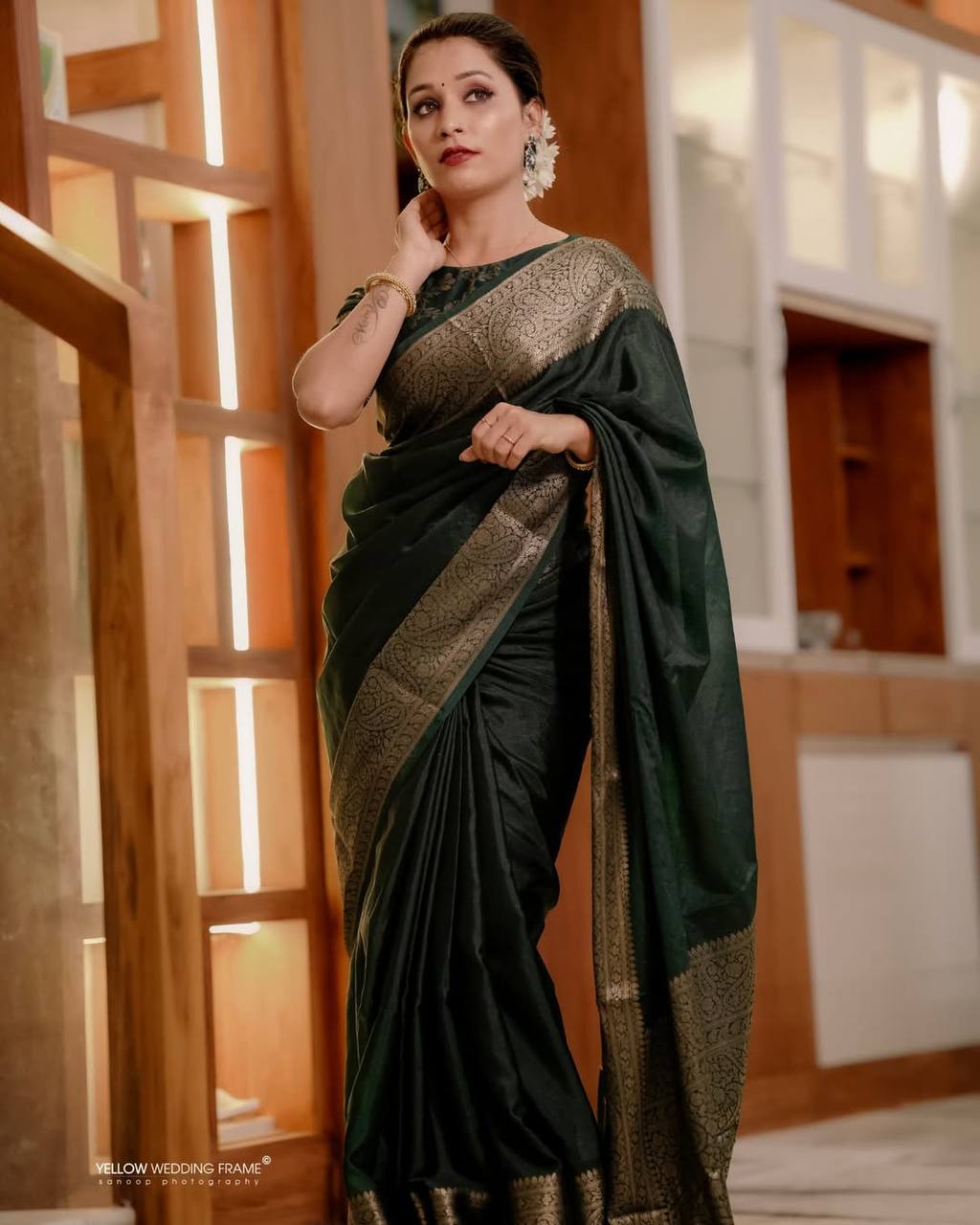 Elegant Dark Green Banarasi Silk Saree with Zari Border