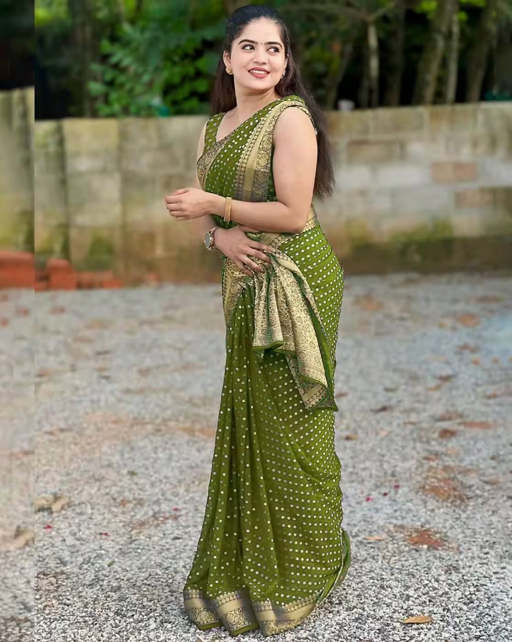 Green Banarasi Silk Saree with Golden Zari Border and Polka Dot Pattern