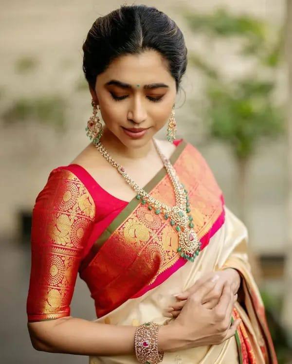 Traditional Off White Silk Saree with Red and Gold Zari Border