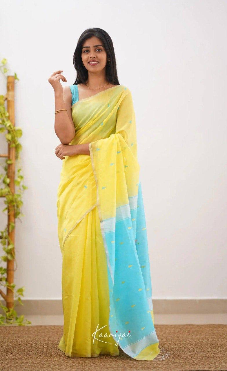 Yellow Linen Saree with Blue Border and Buttas
