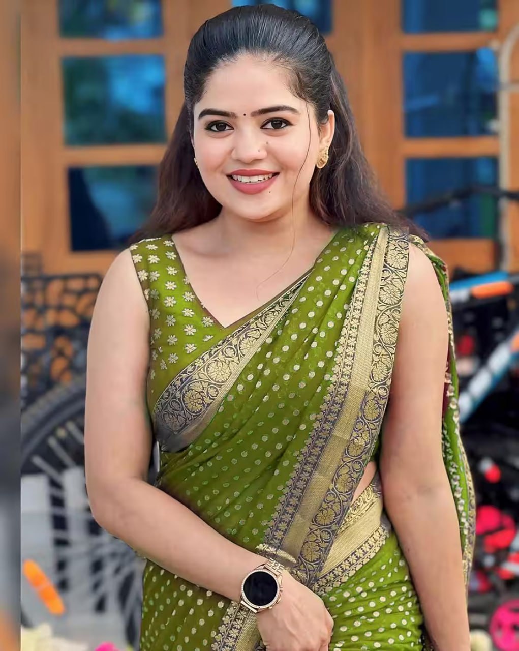 Green Banarasi Silk Saree with Golden Zari Border and Polka Dot Pattern