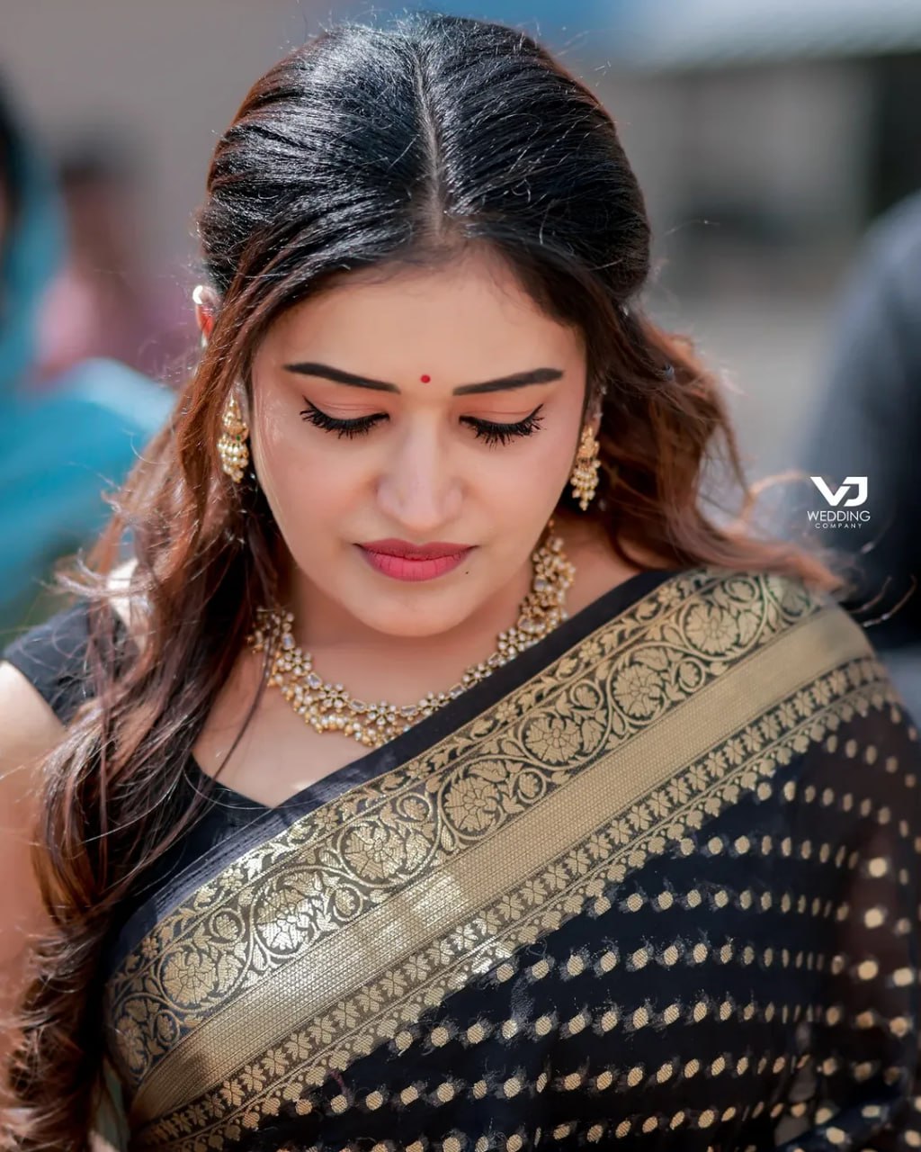 Elegant Black Saree with Golden Border and Sequin Work
