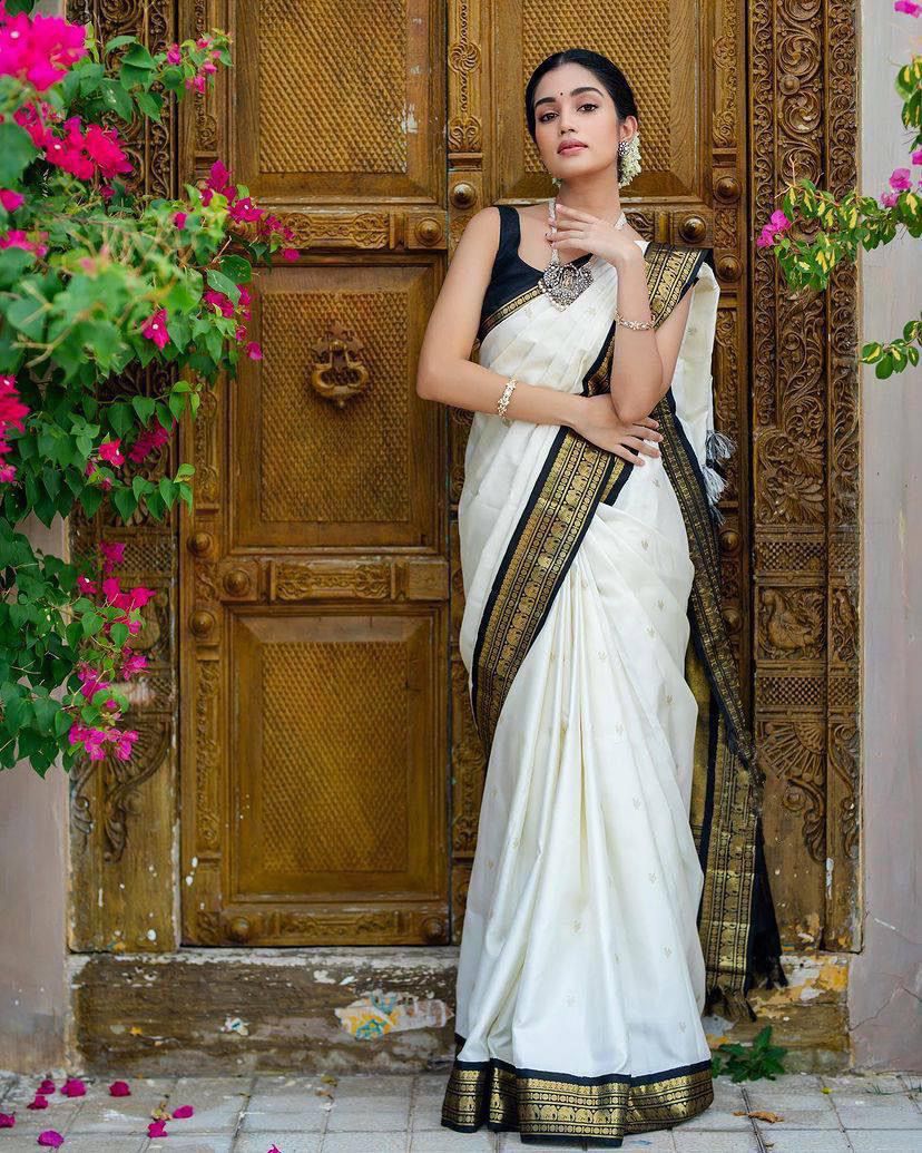 Elegant White Silk Saree with Black and Gold Border