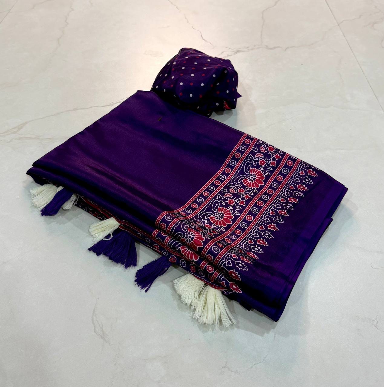 Premium Ajrakh Designer Crepe Silk Saree with Floral Border & Tassel Detailing