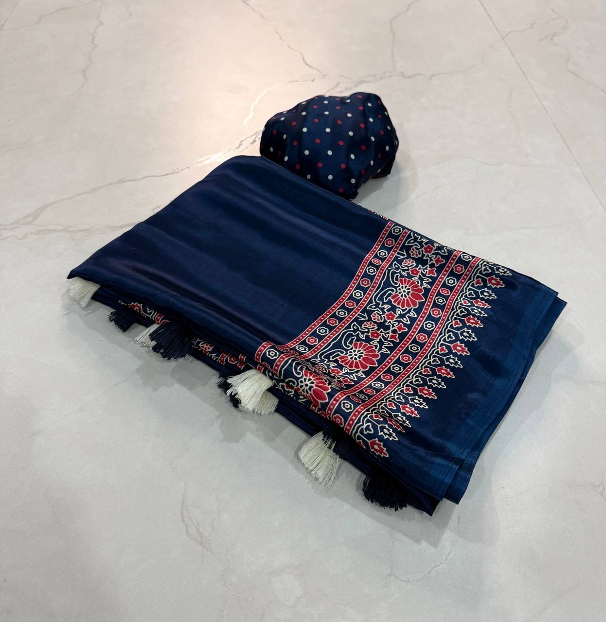 Premium Ajrakh Designer Crepe Silk Saree with Floral Border & Tassel Detailing
